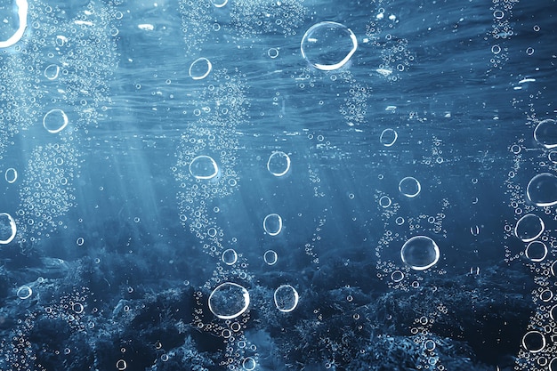 air bubbles underwater blue background, ocean depth diving