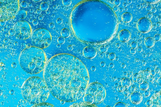 Photo air bubbles in the water backgroundblue tone