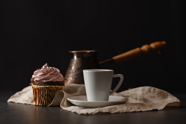 Air cake in a basket with chocolate cream and coffee