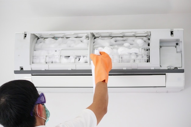 Air conditioner cleaning with spray foam cleaner