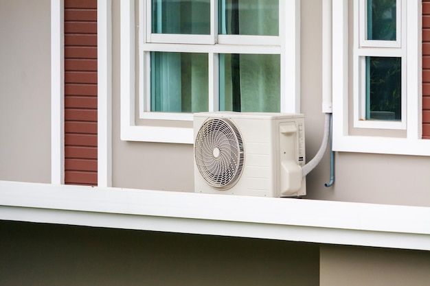 Air conditioner compressor outdoor unit installed outside the house