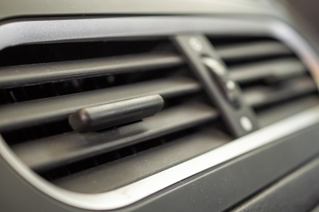 Air conditioner in modern compact car close up