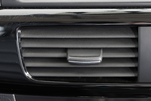 Air conditioner vent grill in a modern car