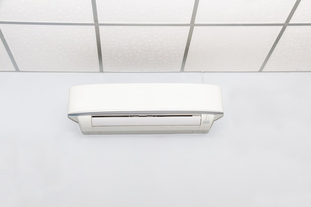 Air conditioner on wall backgroundÃÂ in white room,conditioning