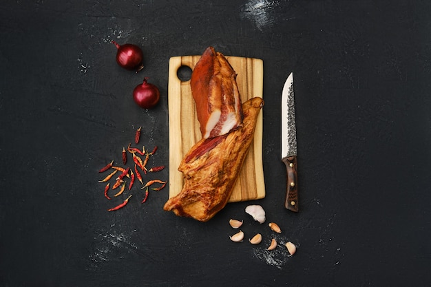 Air dried lamb meat on wooden cutting board