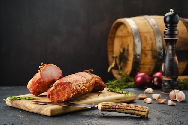 Air dried pork meat on wooden cutting board