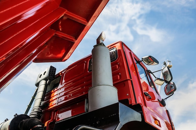 An air filter and a running truck engine against the background