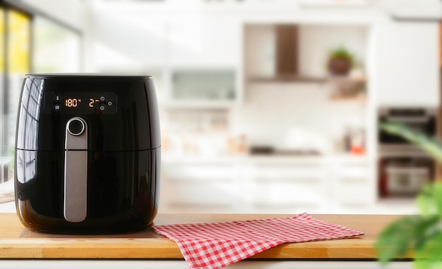 air fryer machine cooking potato fried in kitchen lifestyle of new normal cookingx9