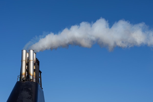 Foto inquinamento atmosferico - rilascio di sostanze inquinanti nell'aria. danni alla salute umana e al pianeta