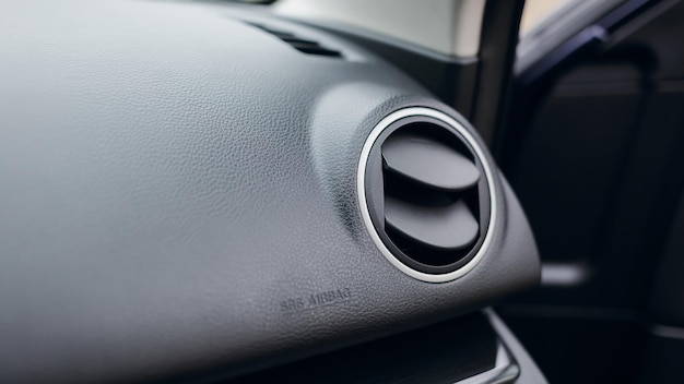 Air vent grill and air conditioning in modern car interior