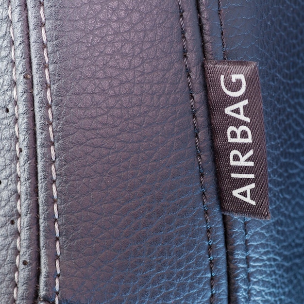 Airbag label on the side of a car seat