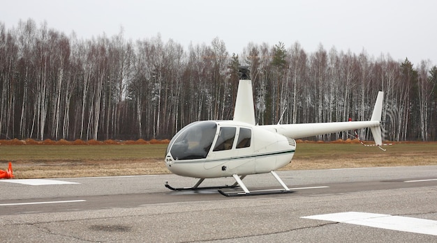 Aircraft Small white helicopter side view