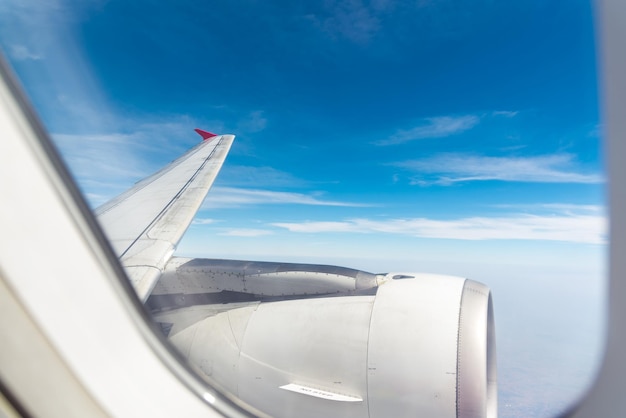 Aircraft wing against sky