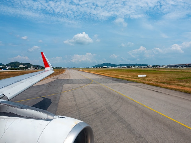 Aircraft wing flying on the sky.