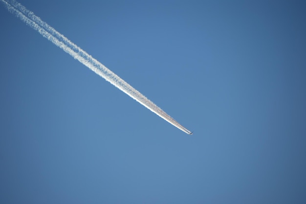 Aircraft with vapor trail