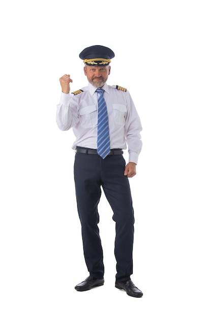 Airline pilot with arms raised