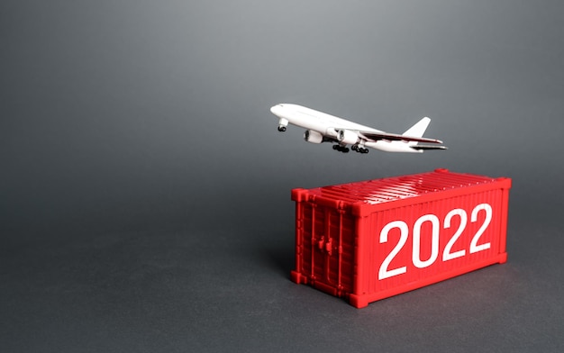 Airplane and 2022 year ship container analytics forecasting of\
freight traffic next year development of infrastructure projects\
express air delivery goods transportation logistics import\
export