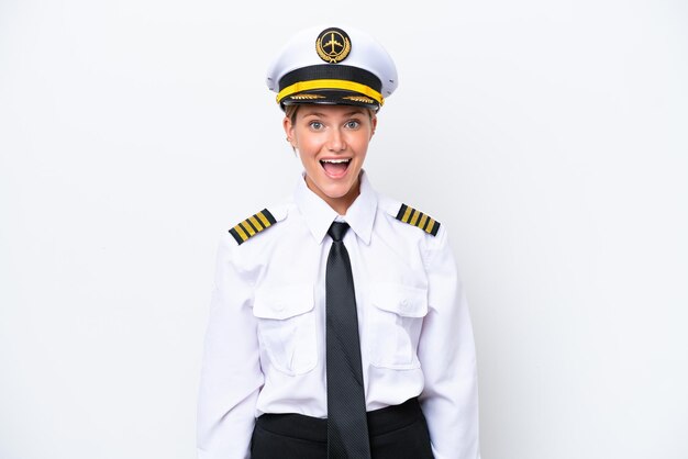 Airplane caucasian pilot woman isolated on white background with surprise facial expression