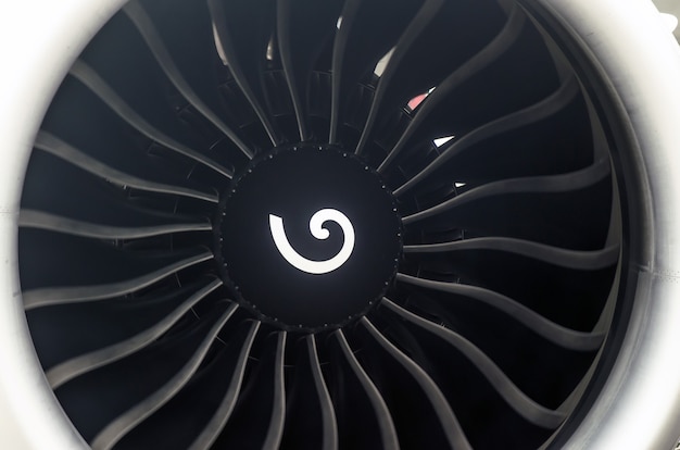 Photo airplane engine blades passenger airliner close up.