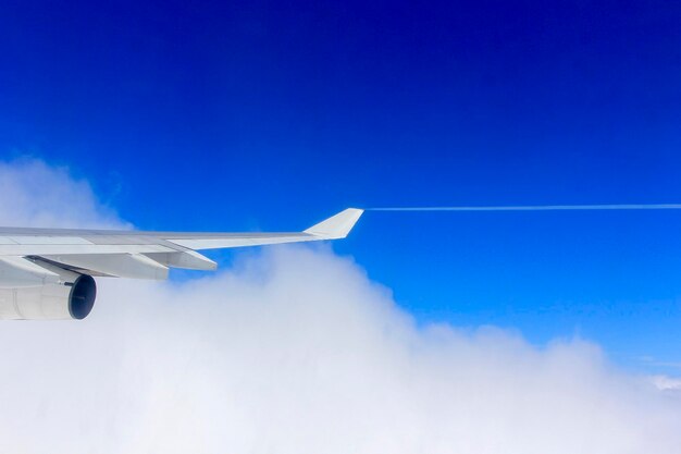 Airplane flying against sky