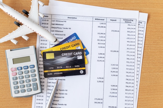 Photo airplane model and calculator on documents