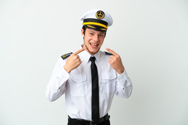 Airplane Russian pilot isolated on white background giving a thumbs up gesture