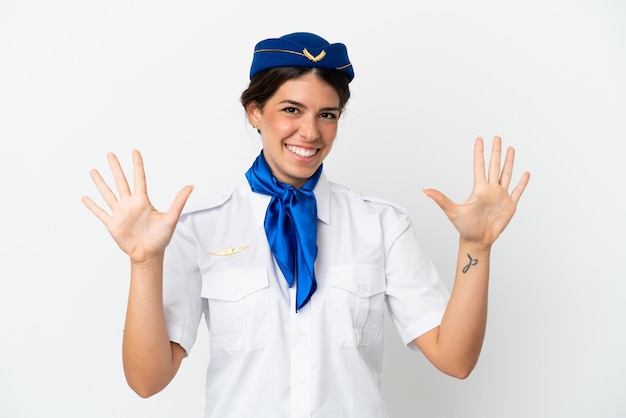 Airplane stewardess caucasian woman isolated on white background counting ten with fingers