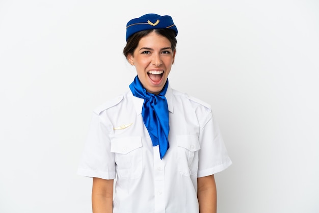 Airplane stewardess caucasian woman isolated on white background with surprise facial expression