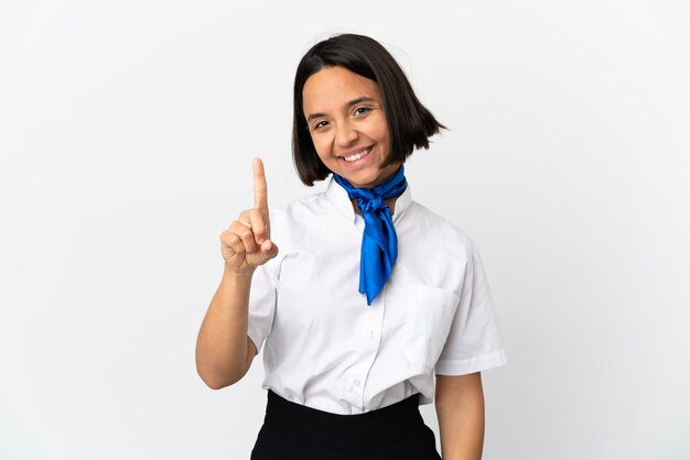 Airplane stewardess over isolated background showing and lifting a finger