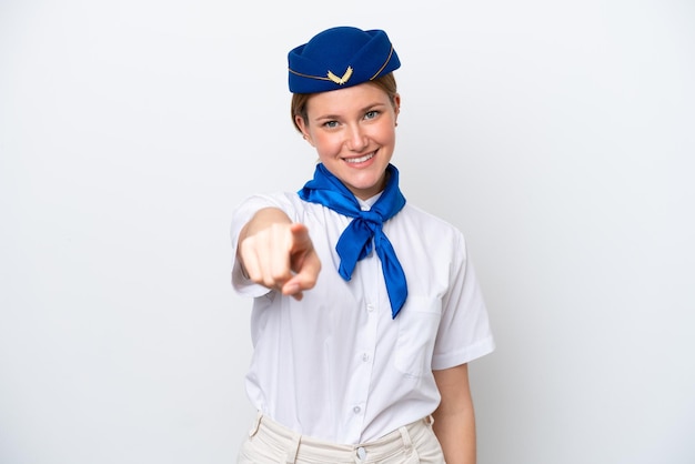 Airplane stewardess woman isolated on white background points finger at you with a confident expression