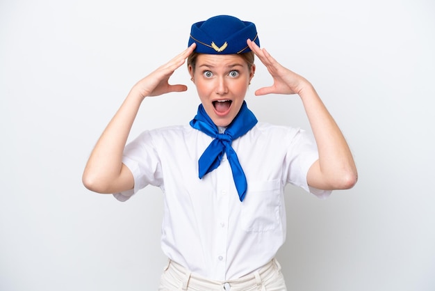 Airplane stewardess woman isolated on white background with surprise expression