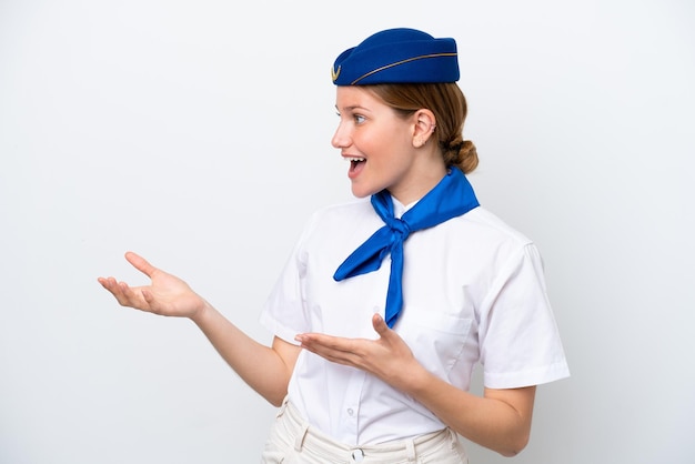 Airplane stewardess woman isolated on white background with surprise facial expression