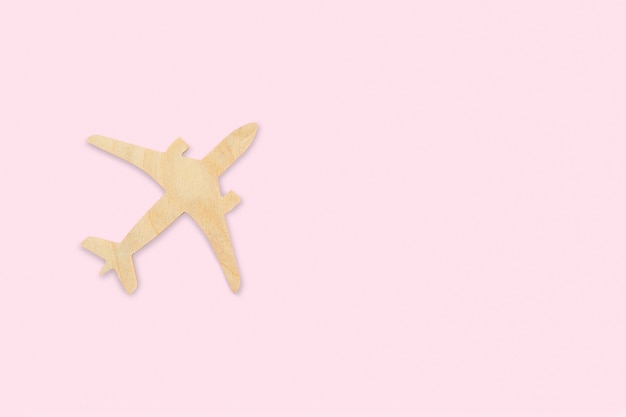 Airplane, toy wooden jet, vacation planning, flight search, ticket booking, travel insurance, dreams, tourism, minimalistic