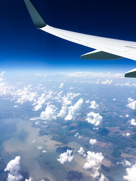 Airplane wing and clouds