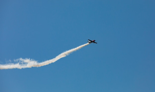 Airplane with a trace of smoke