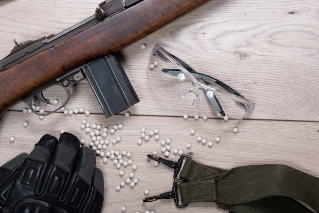 Airsoft gun with protective glasses and lot of bullets