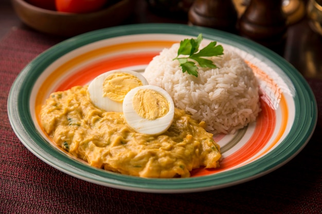 Aji de gallina chicken cream Peruvian traditional comfort food restaurant serving