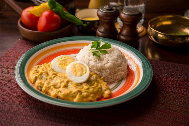 Aji de gallina chicken cream Peruvian traditional comfort food restaurant serving