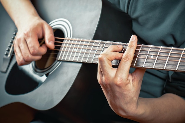 Foto akoestische gitaar spelen