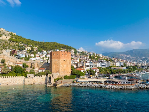 Alanya Turkey August 11 2023 An aerial view of the bay Alanya in Antalya Turkey Sea and city with an open sky Kizil Kule Alanya