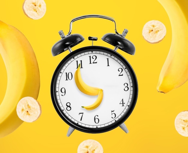 Alarm clock made from bananas with banana slices in background