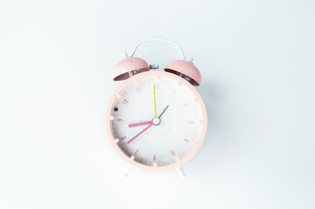 Alarm clock on white background