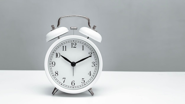 Alarm clock on white table