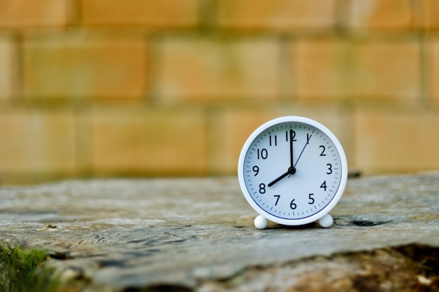 alarm clock with bricked wall