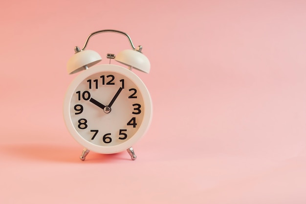 Alarm clock with pink wall