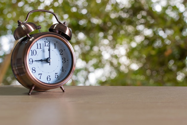 Alarm clock on wood table