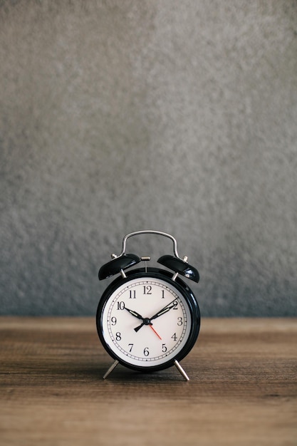 Alarm clock on wood table