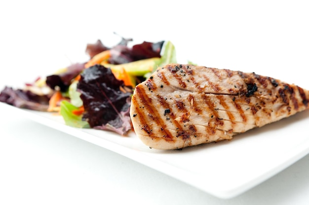 Albacore tuna fish fillet with salad