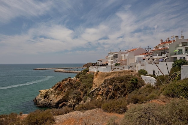 Albufeira cliff and houses aerial view Praia do Peneco Southern Portugal