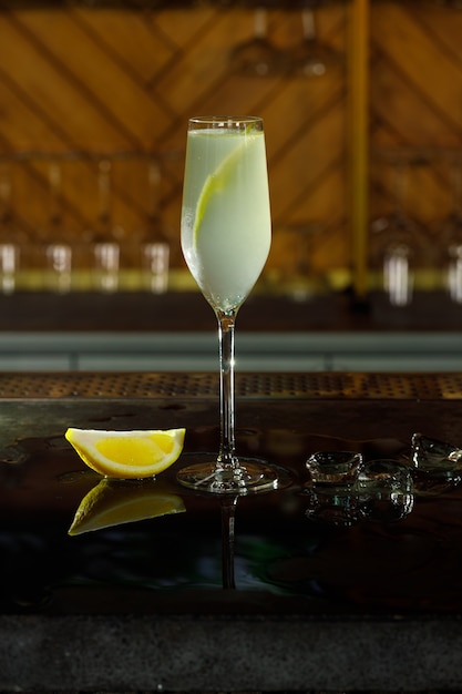 Alcohol bar, cocktail glass on bar counter, cocktail glass in a bar